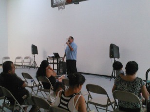 Edgar Flota speaking to the parents about the new state standards