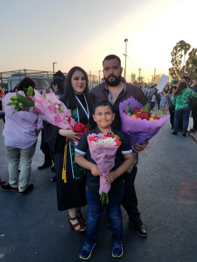 Family, Yuri Chavez, her husband Jose, and her son Jesus on the day of her graduation at East Los Angeles Community College in June 2019.