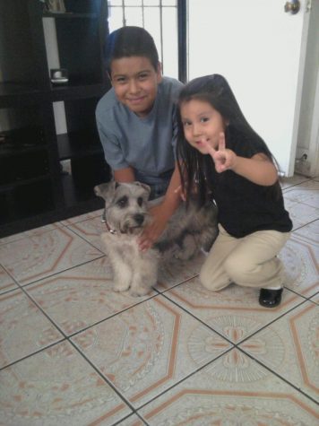 My brother and me with our dog when we were little.