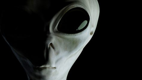 Close-up view on aliens face. 3D rendered illustration.