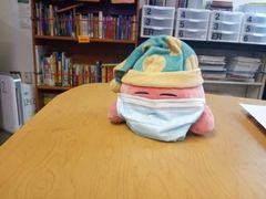 Kirby is wearing a mask at school to show that Covid is serious and people should wear masks outside.