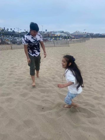 My niece and I at the beach in Santa Monica having a great time playing in the sand.