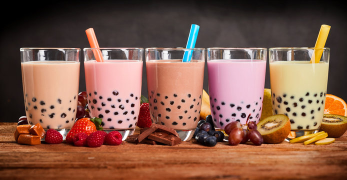 This is Bubble Tea (Milk Tea, Boba) a milk drink made with tapioca or honey balls, It is surpising that it originates from Taiwan.