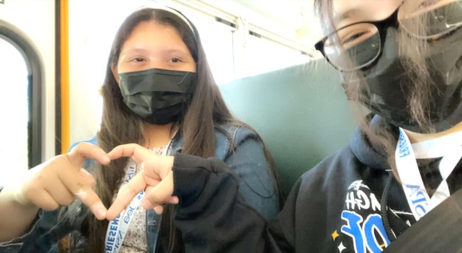 My friend Natalia Rivera and I on the bus on our way back to the school while talking about how fun the convention was.