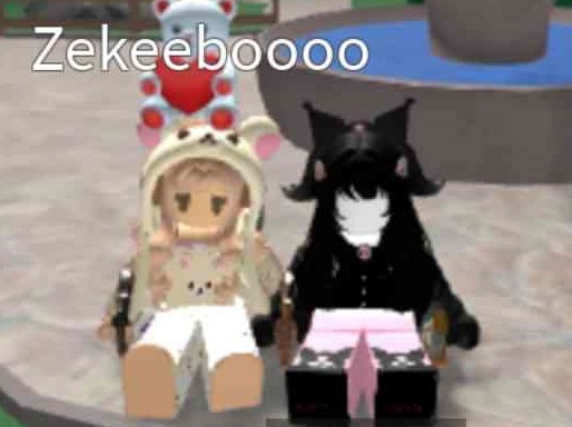Sabrina and her friend playing a game on Roblox.