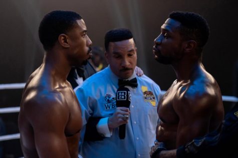 Adonis Creed and Damien about to have a boxing match.