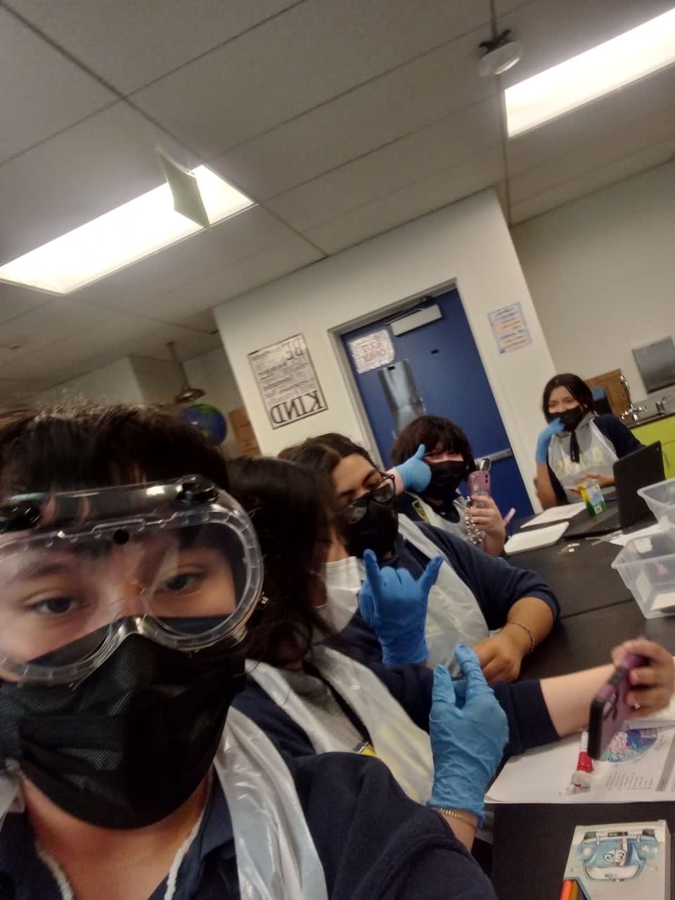 Jennifer and her friends in science class.