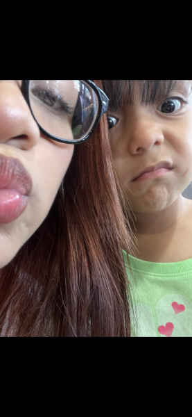 Fernanda with her little sister Regina. 
