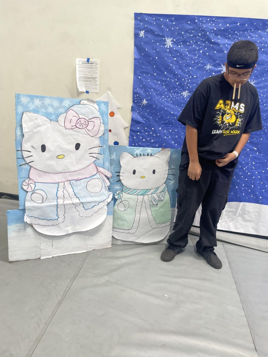 Giovanny at the winter festival with Hello Kitty.  
