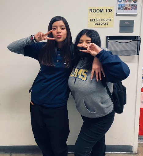 Blissany Mendoza taking a picture with her best friend Yaretzi Pineda.