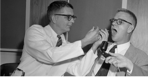 A picture of Dr. Harry Williams and Carl Pfeiffer conducting the LSD experiment.