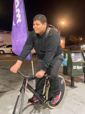 Lupe on his bike.