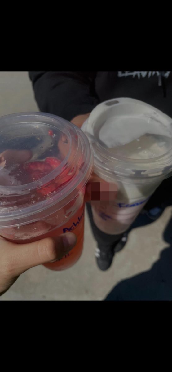 Ashley Santiago and I drinking our Starbucks on the Cal State Northridge college field trip. 