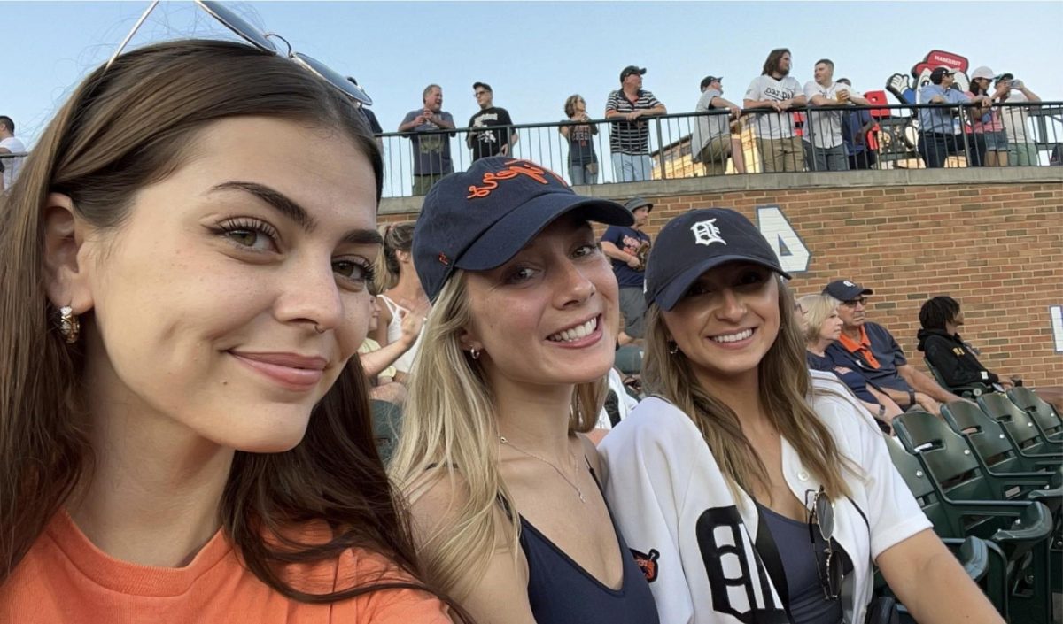 Ms. Brede at a Detroit Tigers game at Comerica Park with her Michigan friends.
