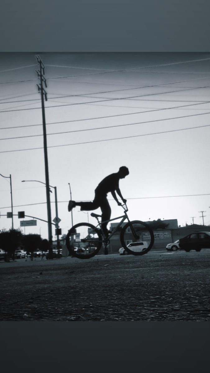 He loves to bike.
Alex took the picture with his phone.
