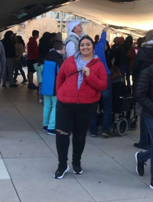 Crystal Vasquez next to the Cloud Gate in Chicago, IL 