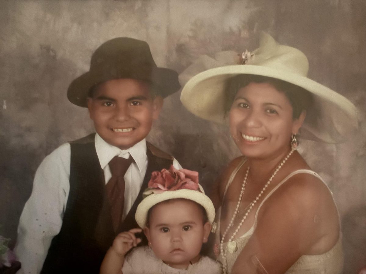 Rosa Cruz and her children (Brianna and Jonathan Cruz) in a family portrait. 