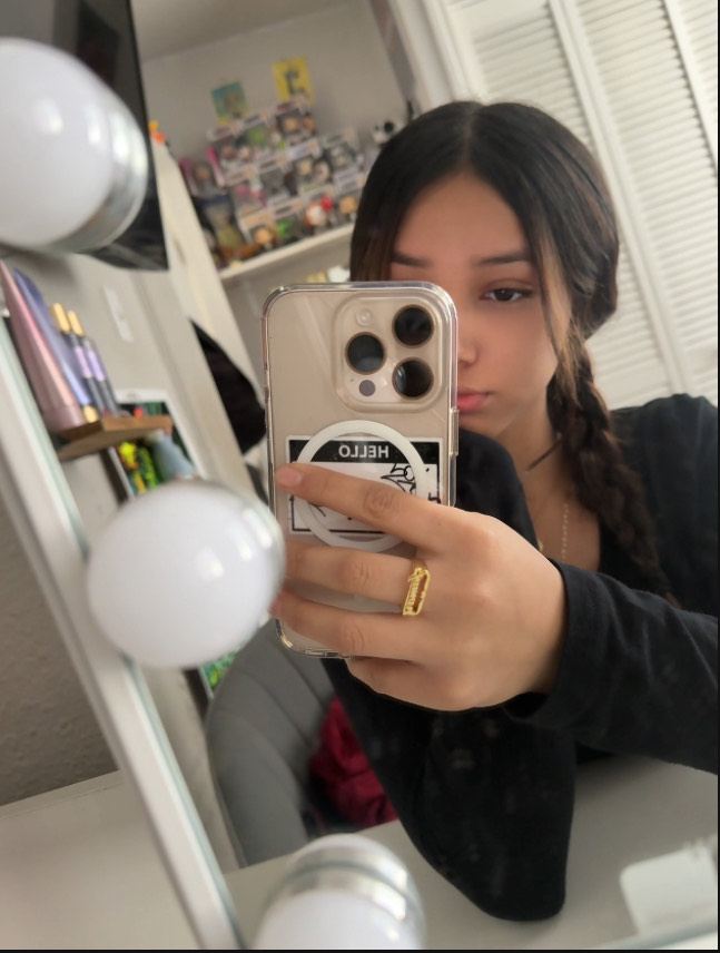 Sophia taking a mirror pic.