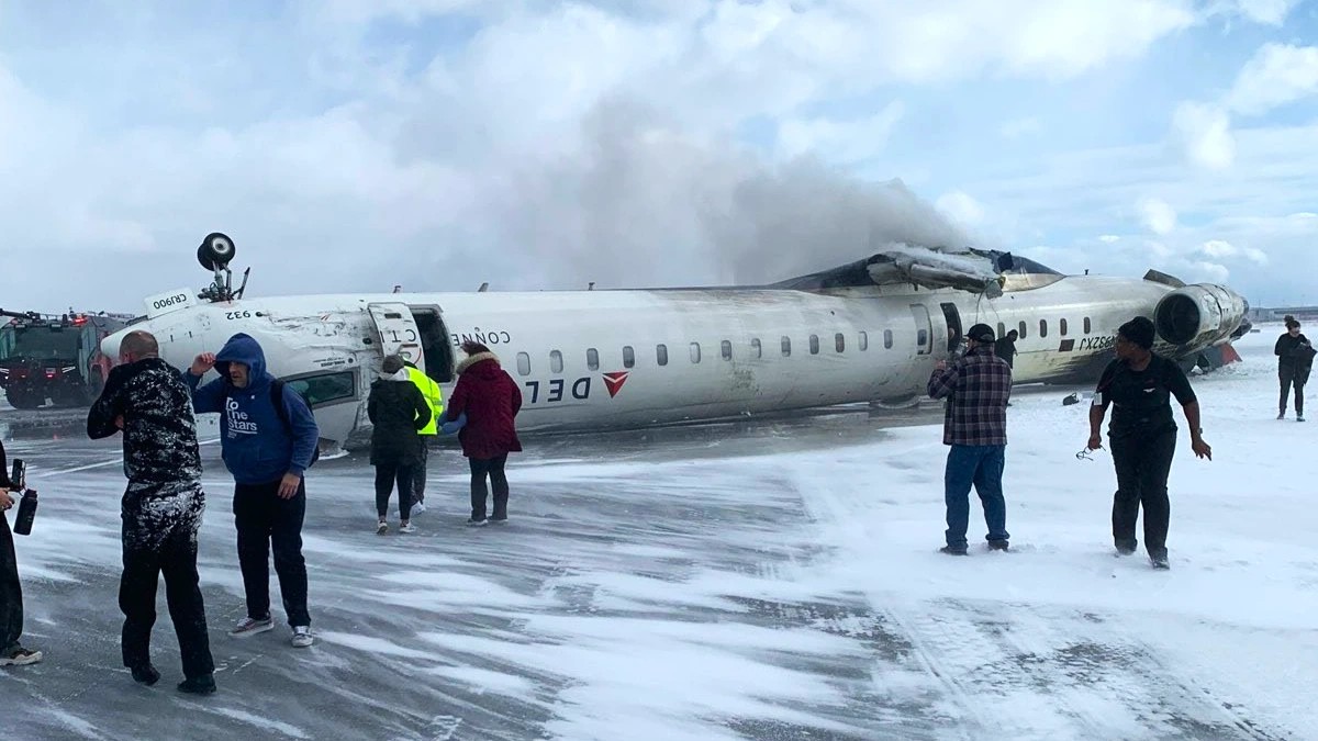 A Delta plane flipped over on the runway in Toronto, Canada.  