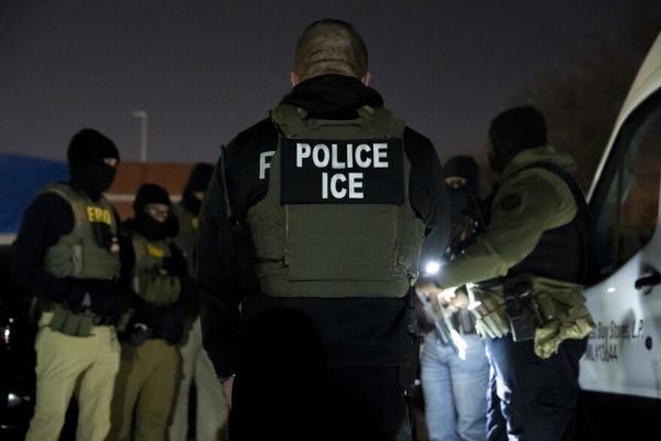 U.S. Immigration and Customs Enforcement officers gather for a briefing before an enforcement operation, Monday, Jan. 27, 2025, in Silver Spring, Md.