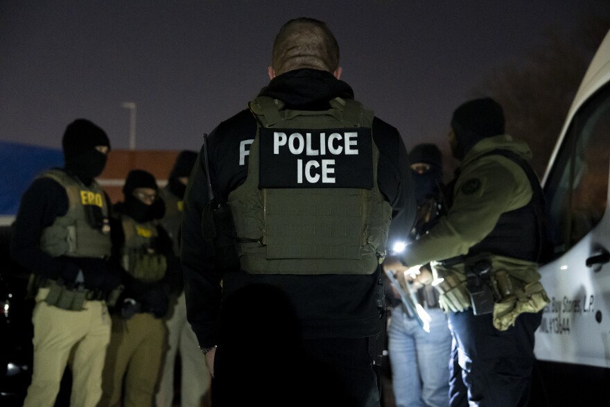 U.S. Immigration and Customs Enforcement officers gather for a briefing before an enforcement operation, Monday, Jan. 27, 2025, in Silver Spring, Md.