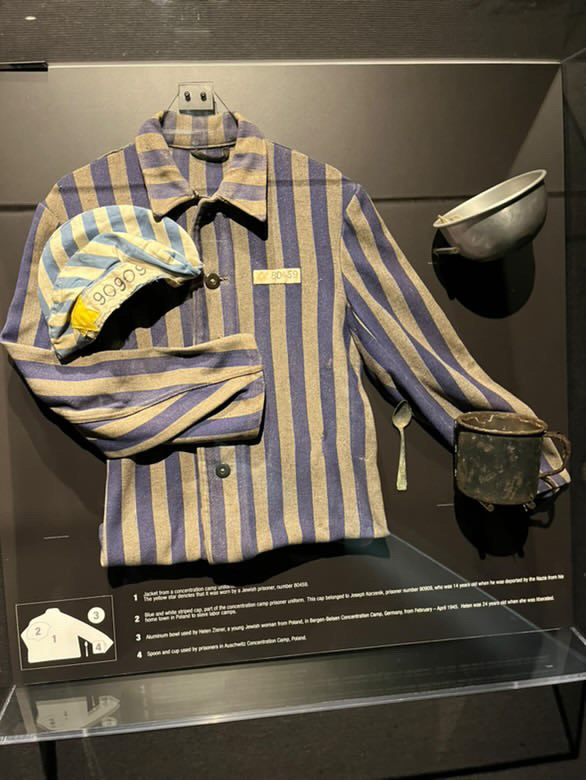 Photo of the uniforms Jews had to wear when they were in the concentration camps.  