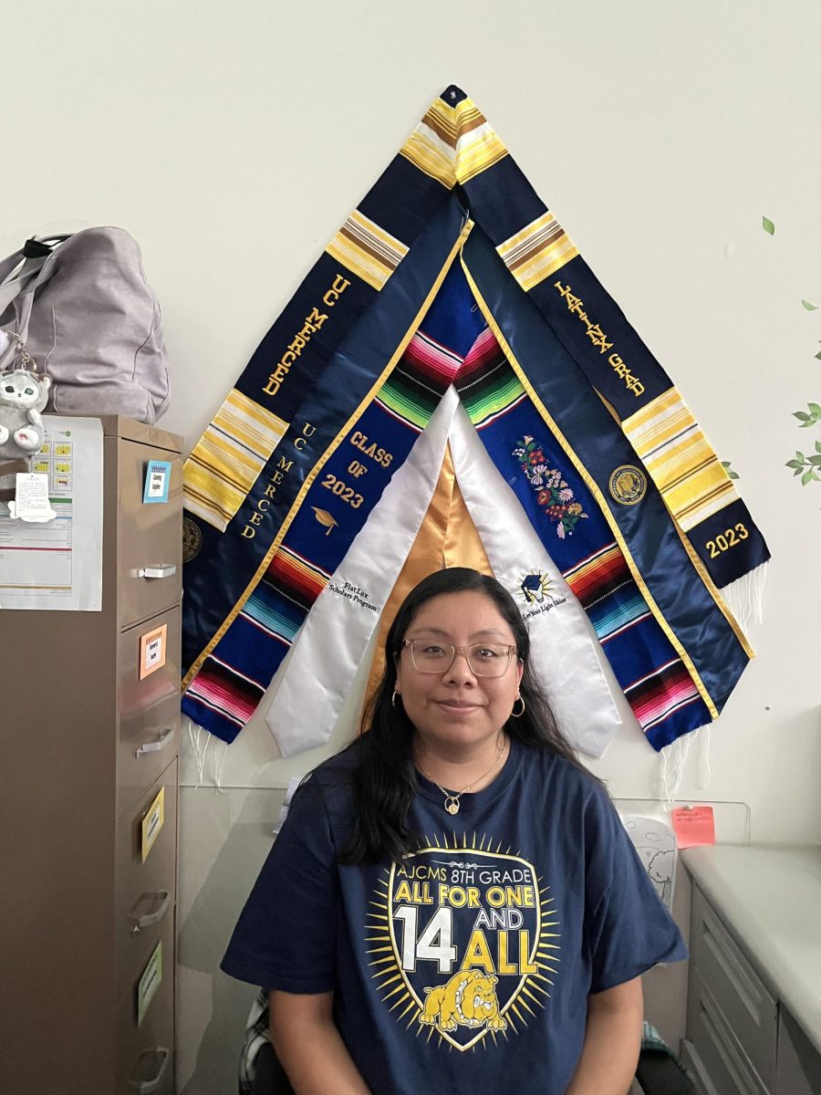 Ms. Ronquillo at her desk working.