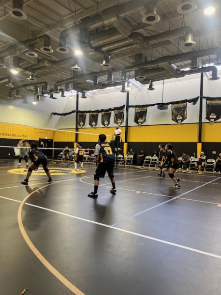 The volleyball team rotating positions.