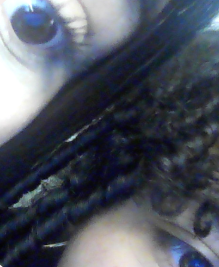 Melisa and Dayana taking a photo of their eyes for the aesthetics.