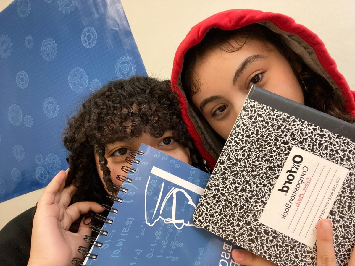 Melisa and Esther on a Saturday doing some school work for the Jaime Escalante Math Program.