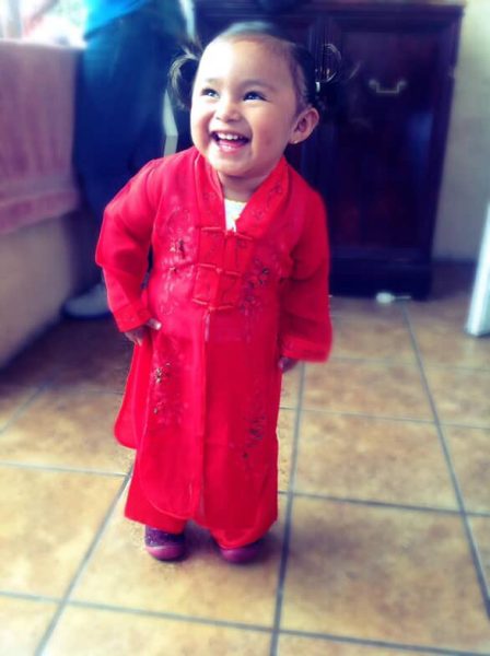 Alia poses for a picture as an toddler.
