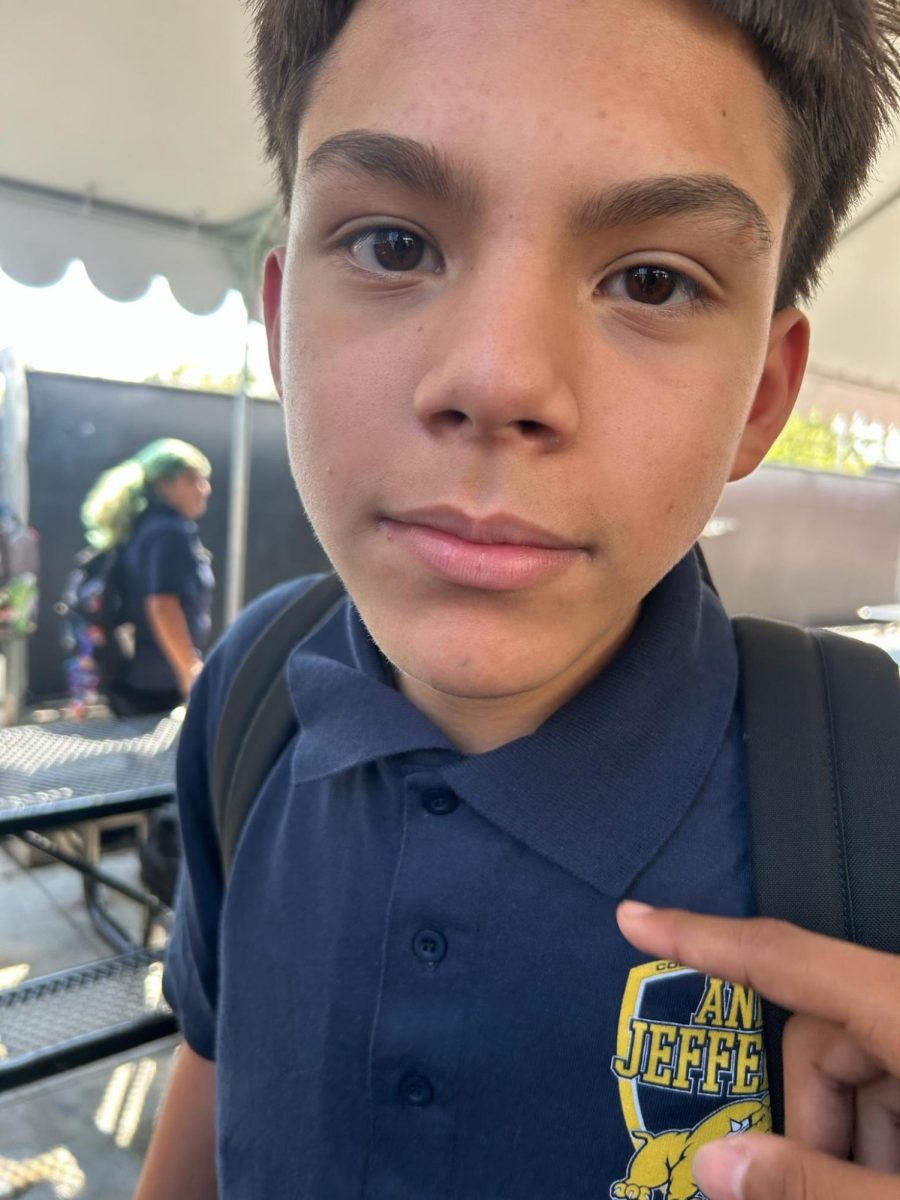 Edwin Leiva smiles in the lunch area.