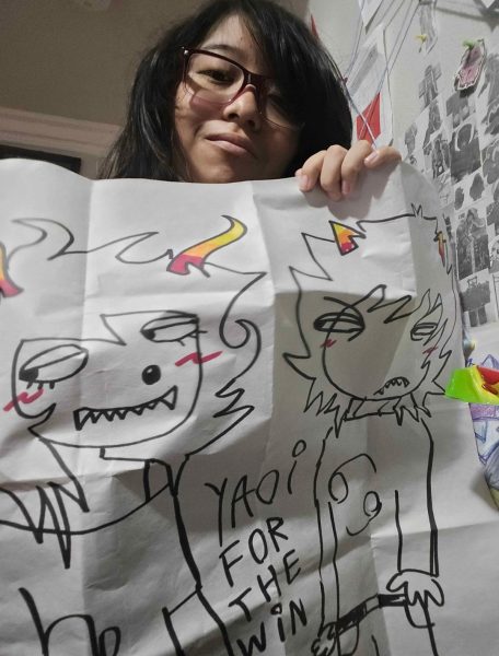 Amy shows a drawing she made about two characters she likes from Homestuck.