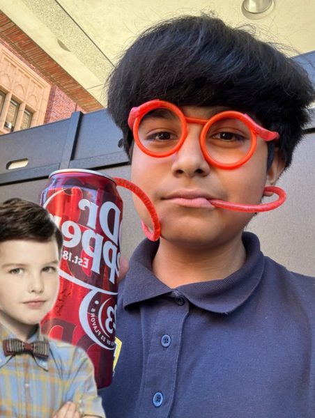 Johann drinks Dr. Pepper joyously through straw glasses. He bought the glasses and Dr. Pepper at the USC student store. 