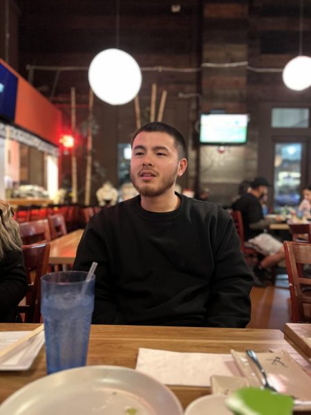 John Youn eats at a sushi restaurant. The restaurant was named "Sushi Story."