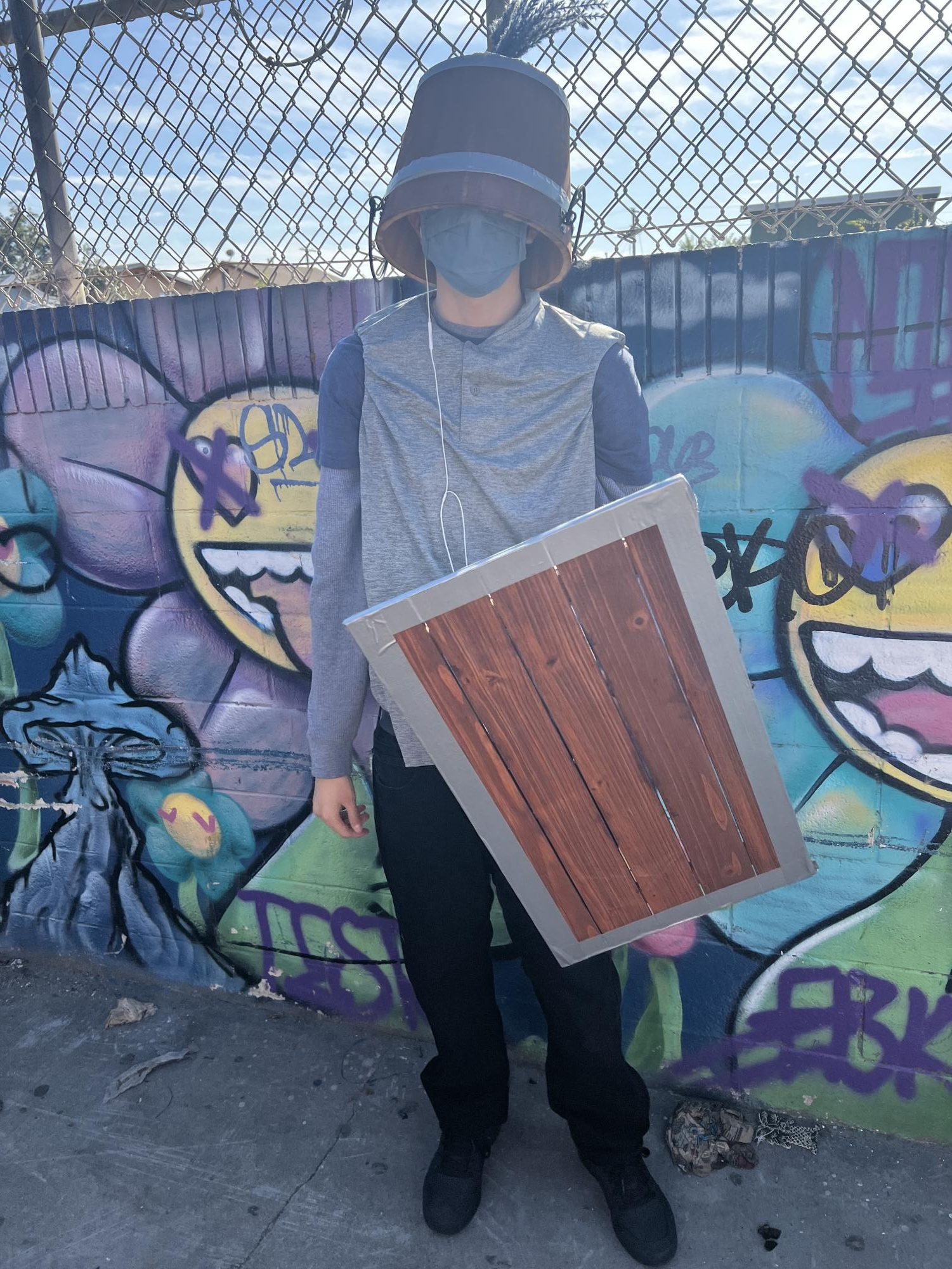 Raymond dressed up as Royal delivery from Clash Royale for Halloween.