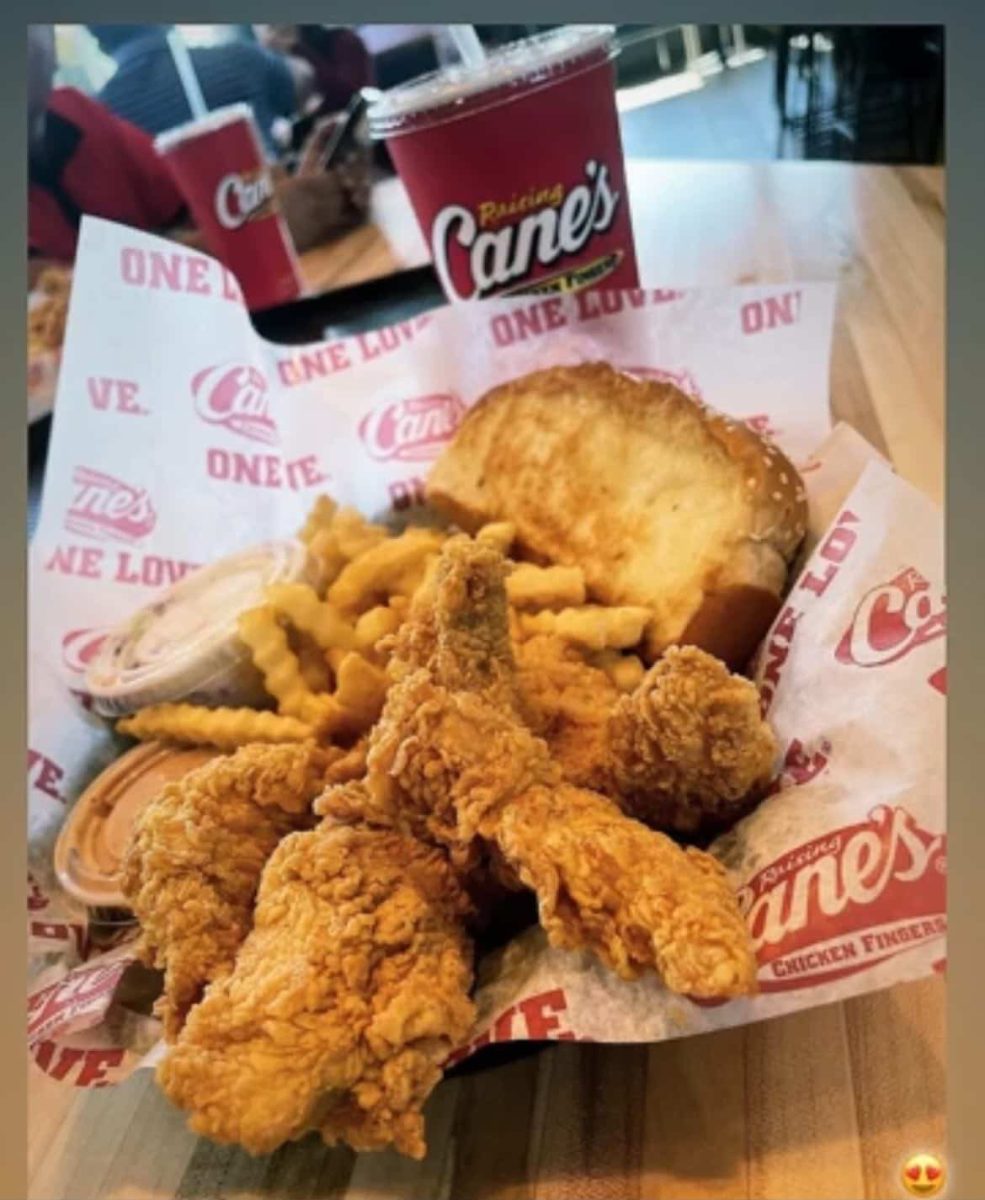 three chicken box combo with a soda.