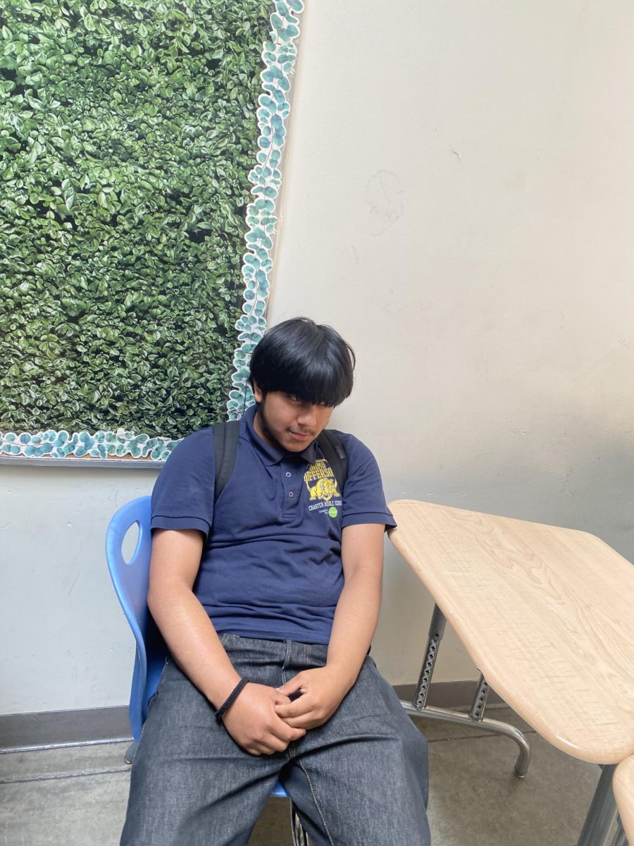 Frank sitting down in Mx. Ortiz' class .