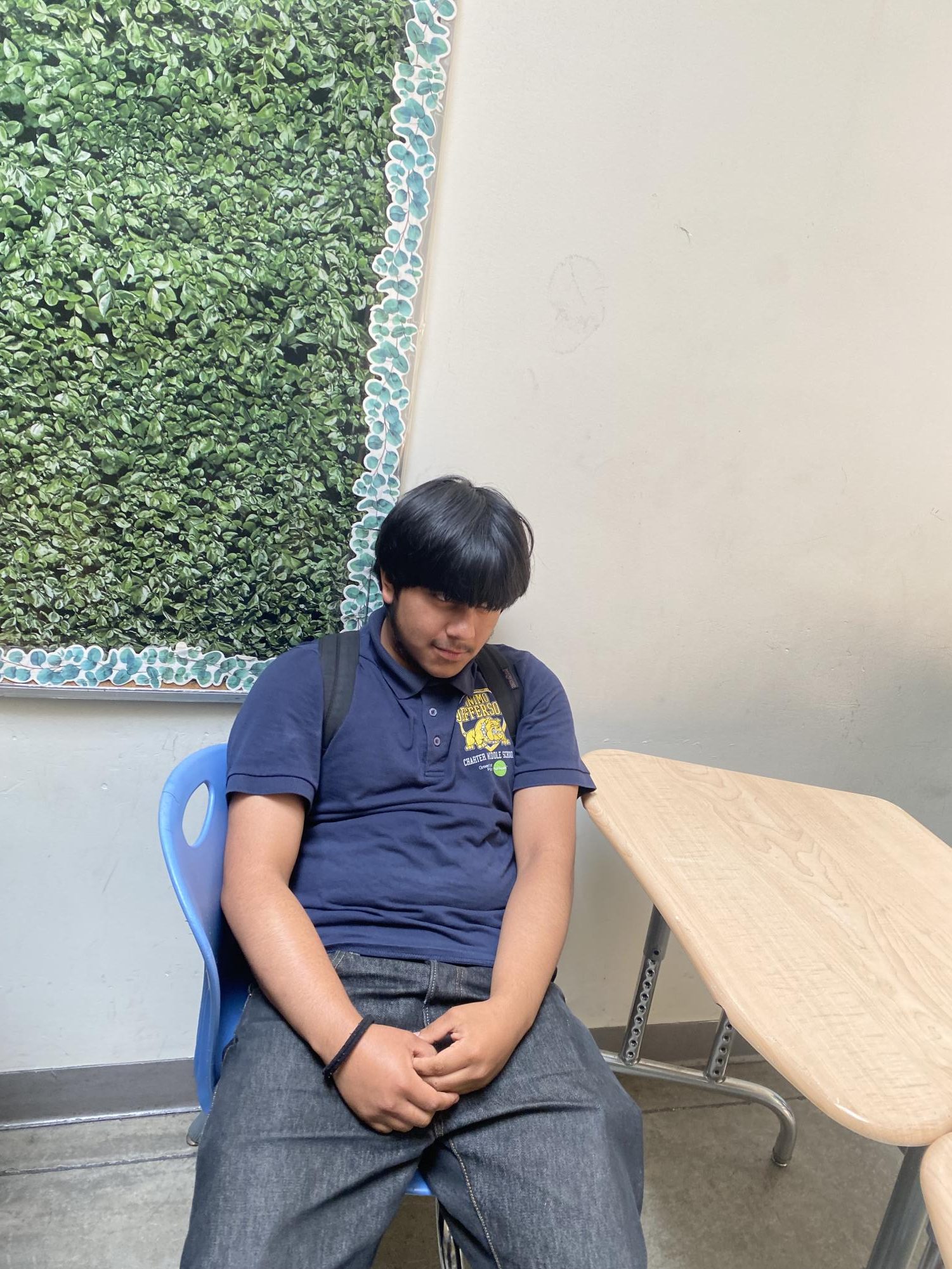 Frank sitting down in Mx. Ortiz' class .